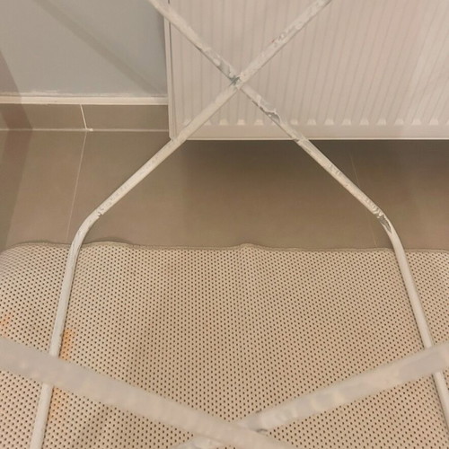Drying rack used with white paint on legs