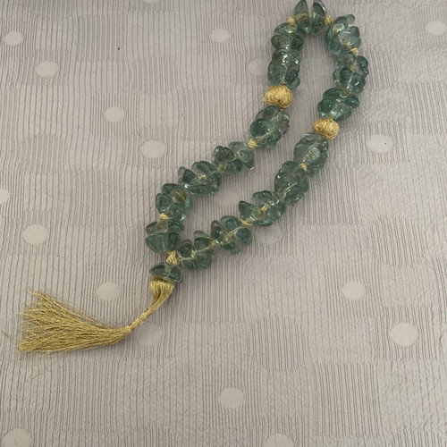 Heavy decorative komboloi with 33 turquoise beads and gold thread