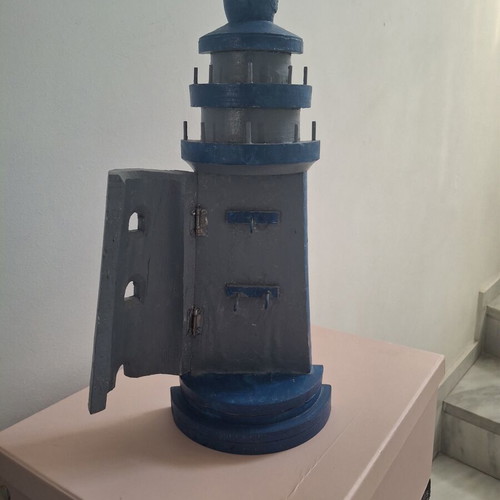 Wall key holder used, lighthouse shape
