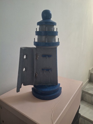 Wall key holder used, lighthouse shape