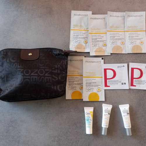 Makeup bag with new sunscreen samples CeraVe Pharmasept Heliocare