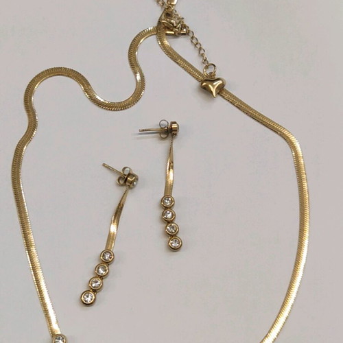 Jewelry set made of gold-colored steel new, necklace and earrings