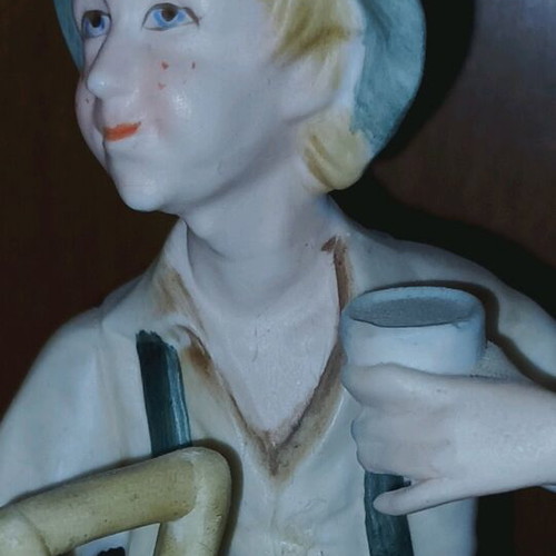 Decorative figurine like new with boy farmer and shovel