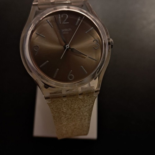 Swatch Gent Sunblush watch like new, gold color, women's