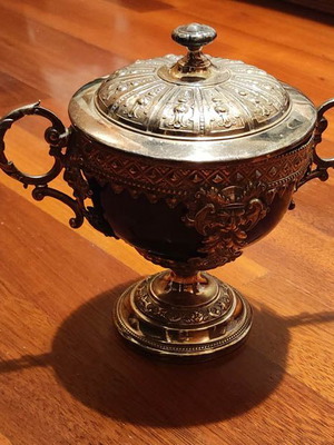Decorative vessel used with glass interior and lid