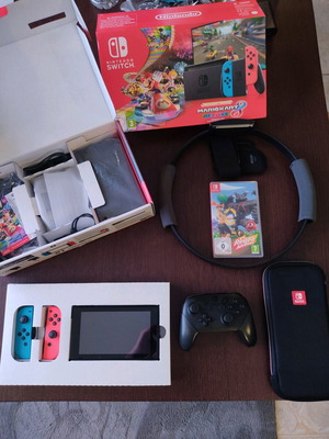 Nintendo Switch σαν καινούργιο με Ringfit Adventure, Pro controller και θήκη