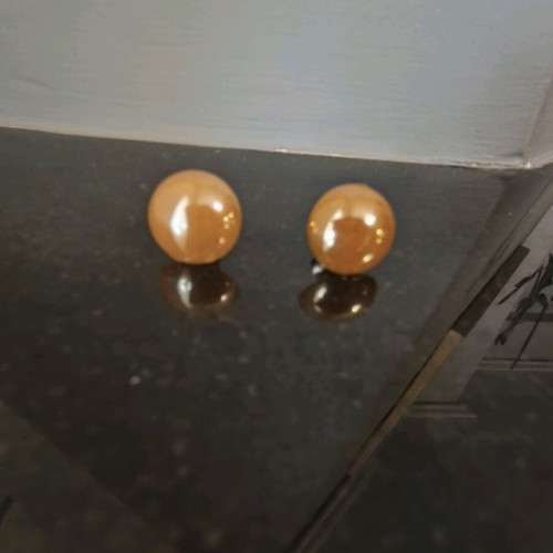 Button earrings in bright honey glossy color like new