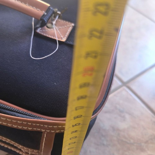 Cosmetic bag like new, blue and brown