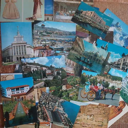 Postcards used, lot of 130 from around the world with maps and guides