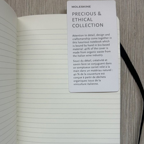 Moleskine black notebook with embossed cover