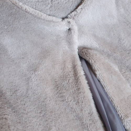 Gray faux fur coat used with soft fur and central button