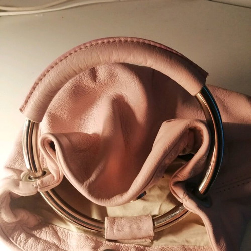 Rollini leather wrist bag new, pink color