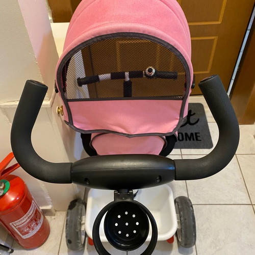 Tricycle pink with parent-controlled steering used