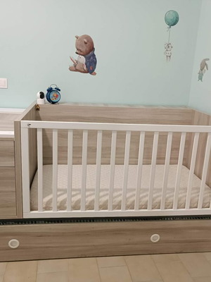 Baby cot used with storage space, drawer unit and single bed