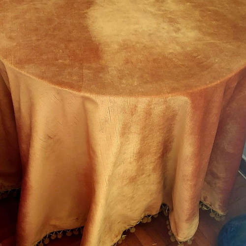 Velvet round tablecloth like new, gold mustard color with tassels