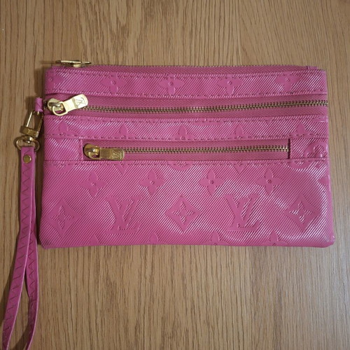 Pink wristlet bag with 3 compartments
