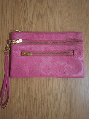 Pink wristlet bag with 3 compartments
