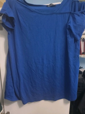 Women's blue blouse like new, size L to XL, elastic