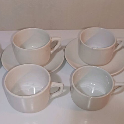 White cups and saucers set of 6 cups and 4 saucers used