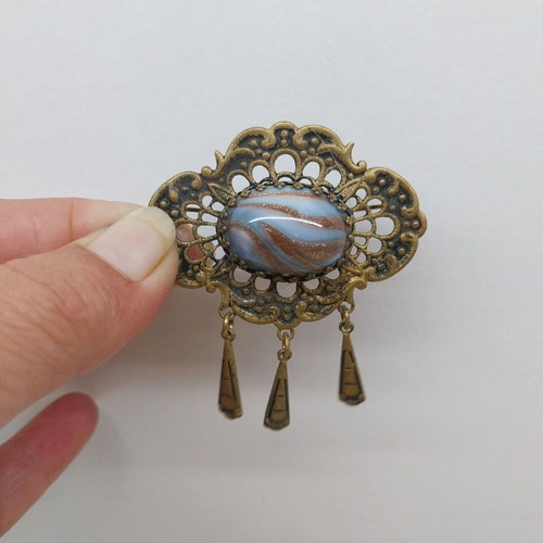 Vintage brass brooch with pendants and cabochon