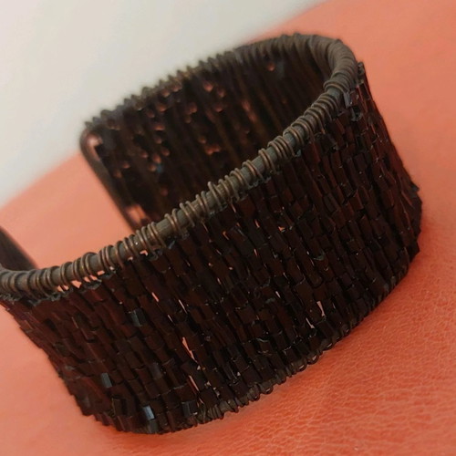 Black bracelet used, adjustable size