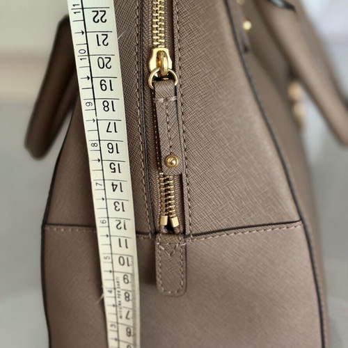 Michael Kors handbag new with shoulder strap, gray beige