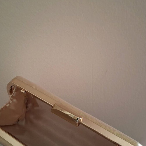 Gold bag like new, can be held as clutch or with strap