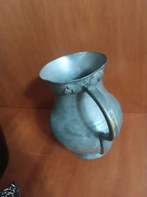 Folk art pitcher used, bronze, late 19th century