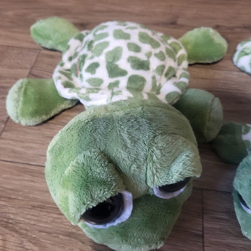 Plush turtles set of 2 like new, one is a case