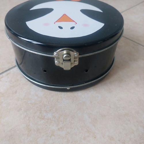 Tiger metal storage box with penguin design like new