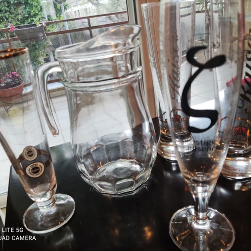 Pitcher and 4 beer glasses like new, set