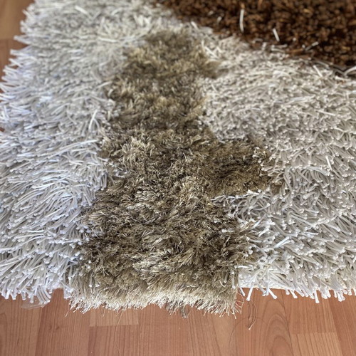 Handmade Shaggy Rug in Ecru and Earth Tones like new