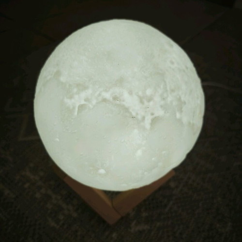 Table lamp used with wooden base and 3 lighting shades
