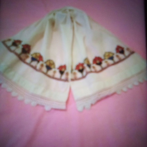 Decorative embroidered towel used, cotton with colorful flowers
