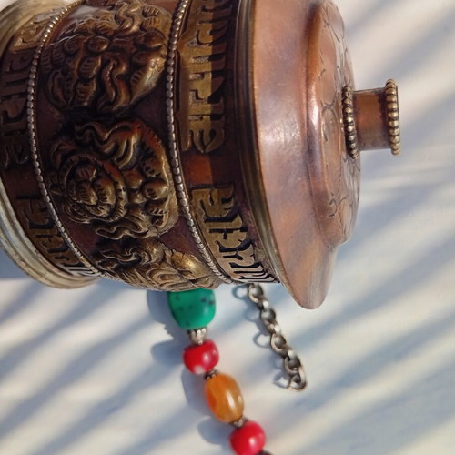 Tibetan prayer wheel used with original thin old paper