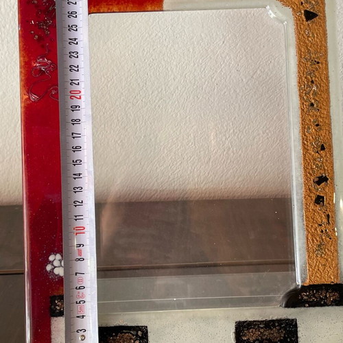 Glass photo frame colored with plexiglass used