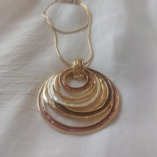 Golden Orbit statement necklace with circular pendant