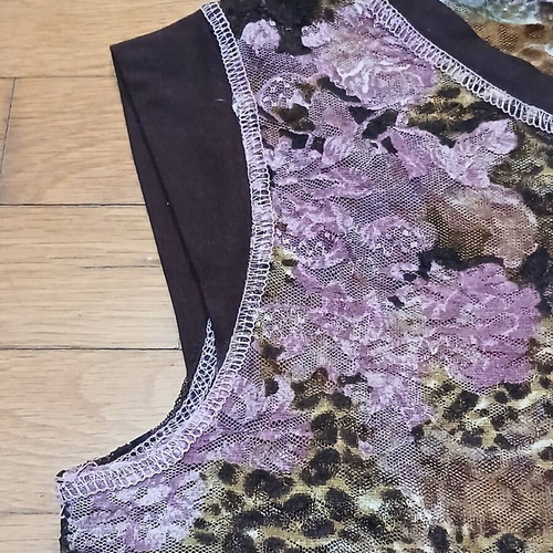Batic sleeveless floral women's top with mixed animal print, like new, size M