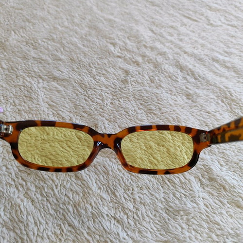 Vintage sunglasses like new with tiger frame and yellow lenses