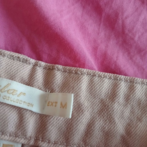 Shorts like new, medium size, pink with studs and rips