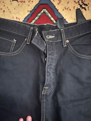 Jean pants like new, black, size medium large with buttons