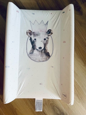 Ceba Baby changing mat used with raised sides and bear design