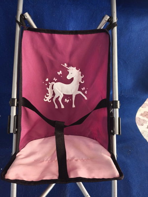 Toy stroller like new, lightweight and foldable