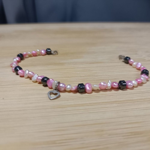 Bracelet with white, black and pink stones, heart charm