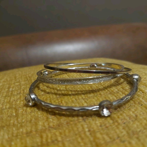 Silver bracelets set of 3 like new with stones and glitter