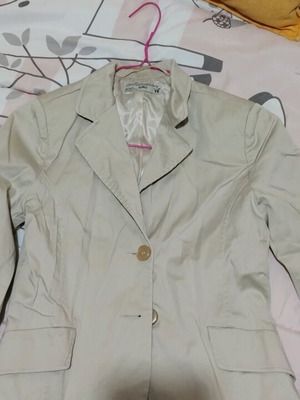 Beige jacket used in good condition
