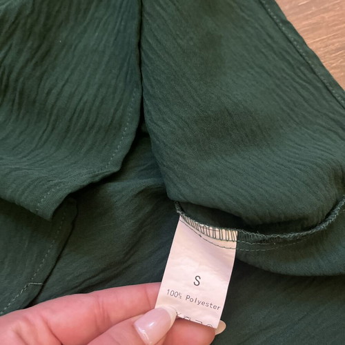 Blouse dark green size S like new with ruffle neck and cuffs