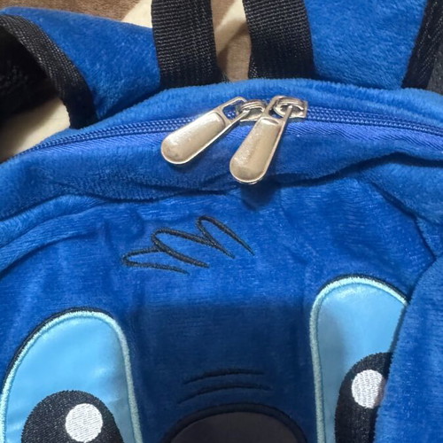 Plush Stitch backpack like new, blue and pink
