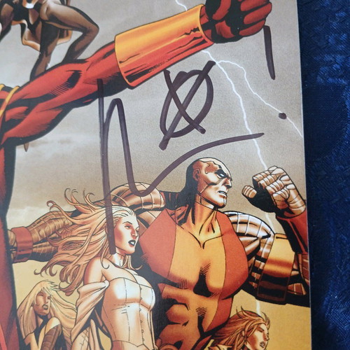Uncanny X-Men #1 Marvel comic like new with two signatures