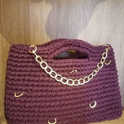 Handmade crochet handbag in eggplant color with gold details